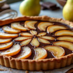 découvrez la recette facile et rapide de la tarte poire chocolat de cyril lignac, un dessert gourmand alliant douceur des poires et richesse du chocolat.